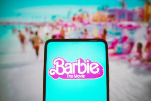 July 21, 2023, Brazil. In this photo illustration, the Barbie the movie logo seen displayed on a smartphone. Barbie is a 2023 American fantasy comedy film Based on the Barbie fashion dolls by Mattel