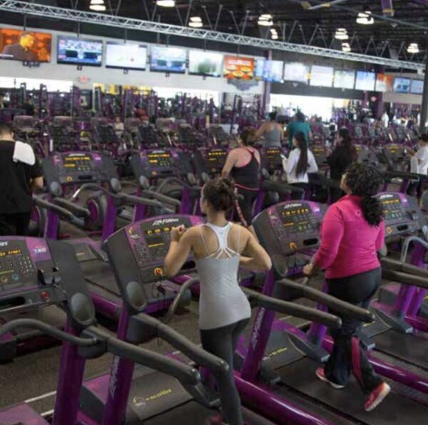 teens working out in planet fitness