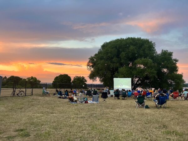 people watching movies during maine outdoor film festival