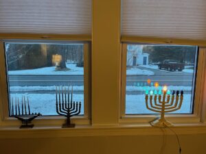 menorahs in maine home window