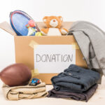 donate to charity items in cardboard box