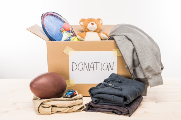 donate to charity items in cardboard box