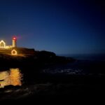 nubble light house at night lit up for christmas