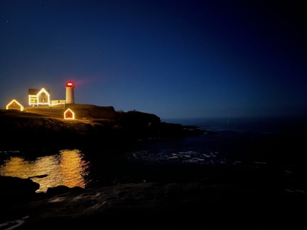 nubble light house at night lit up for christmas
