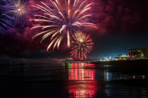 Fireworks explode over the beach at Old Orchard Beach, Maine.