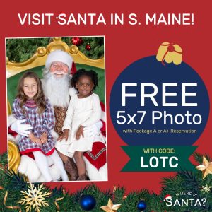 Two children sitting on Santa's lap.